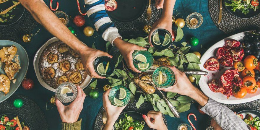 hands-cheersing-at-table.jpg